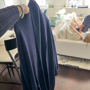 Never worn sweater jacket.  Navy color